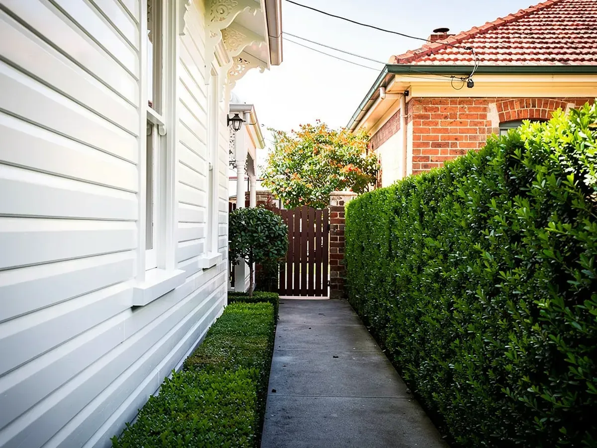 White weatherboard house repainted in Hawthorn, Melbourne