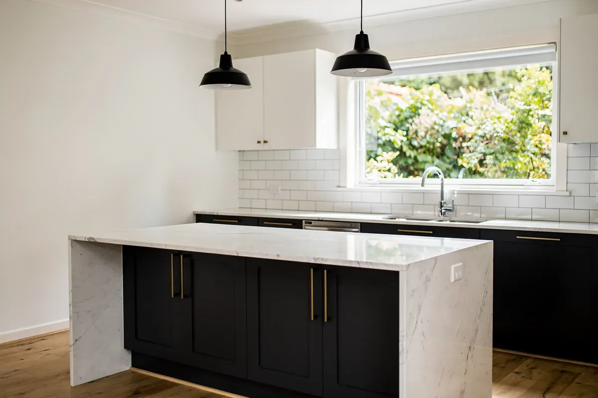 Painted two-storey brick home exterior