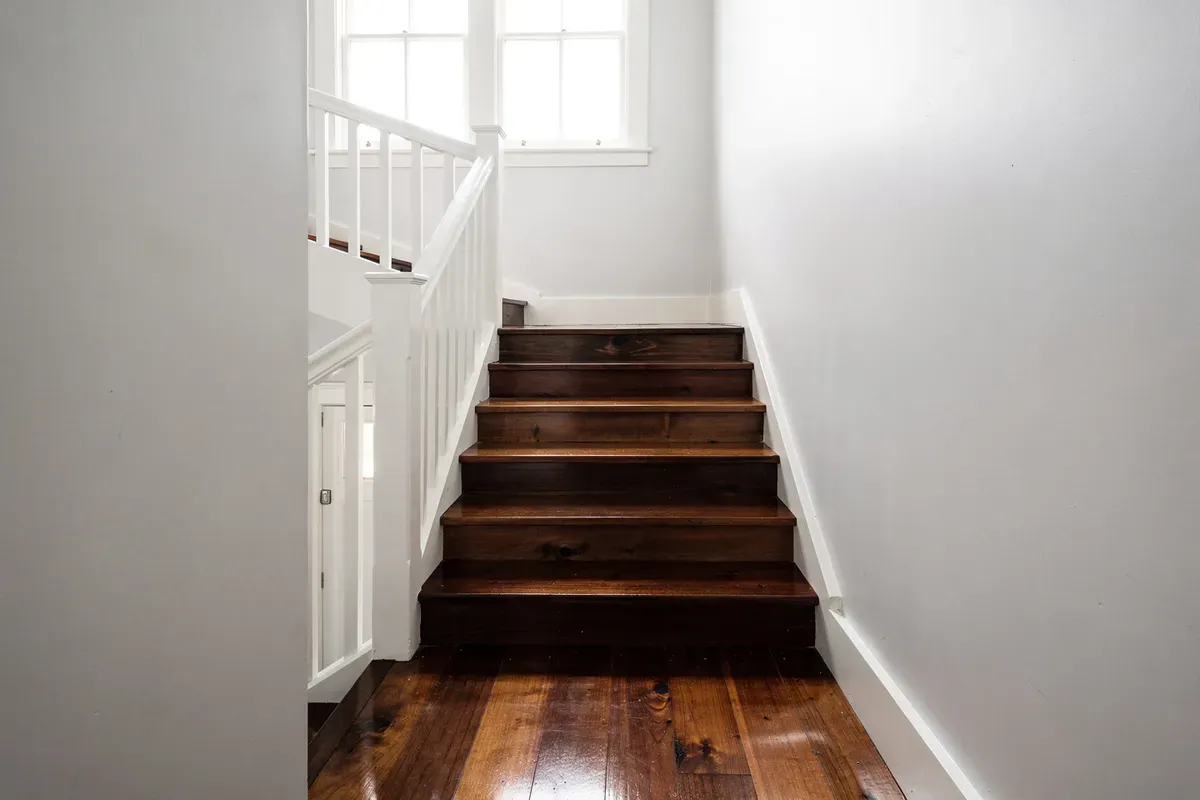 Freshly painted timber staircase in Melbourne period home