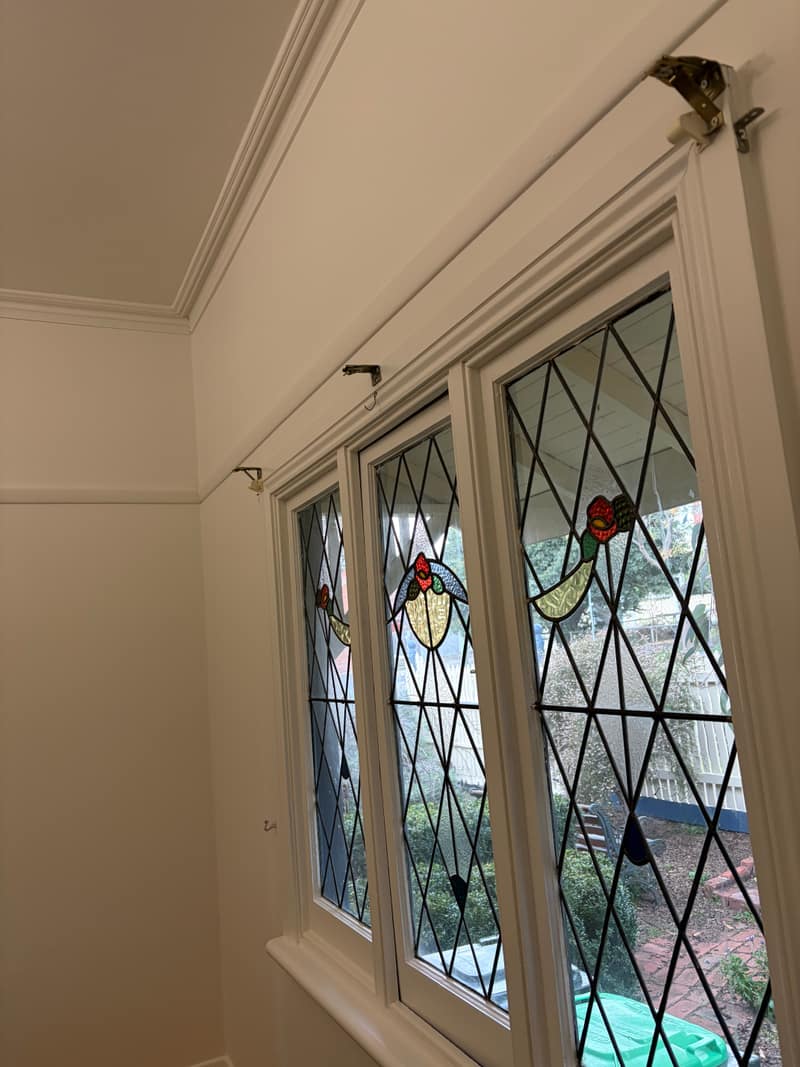 Leadlight windows, sills and cornice repainted in white